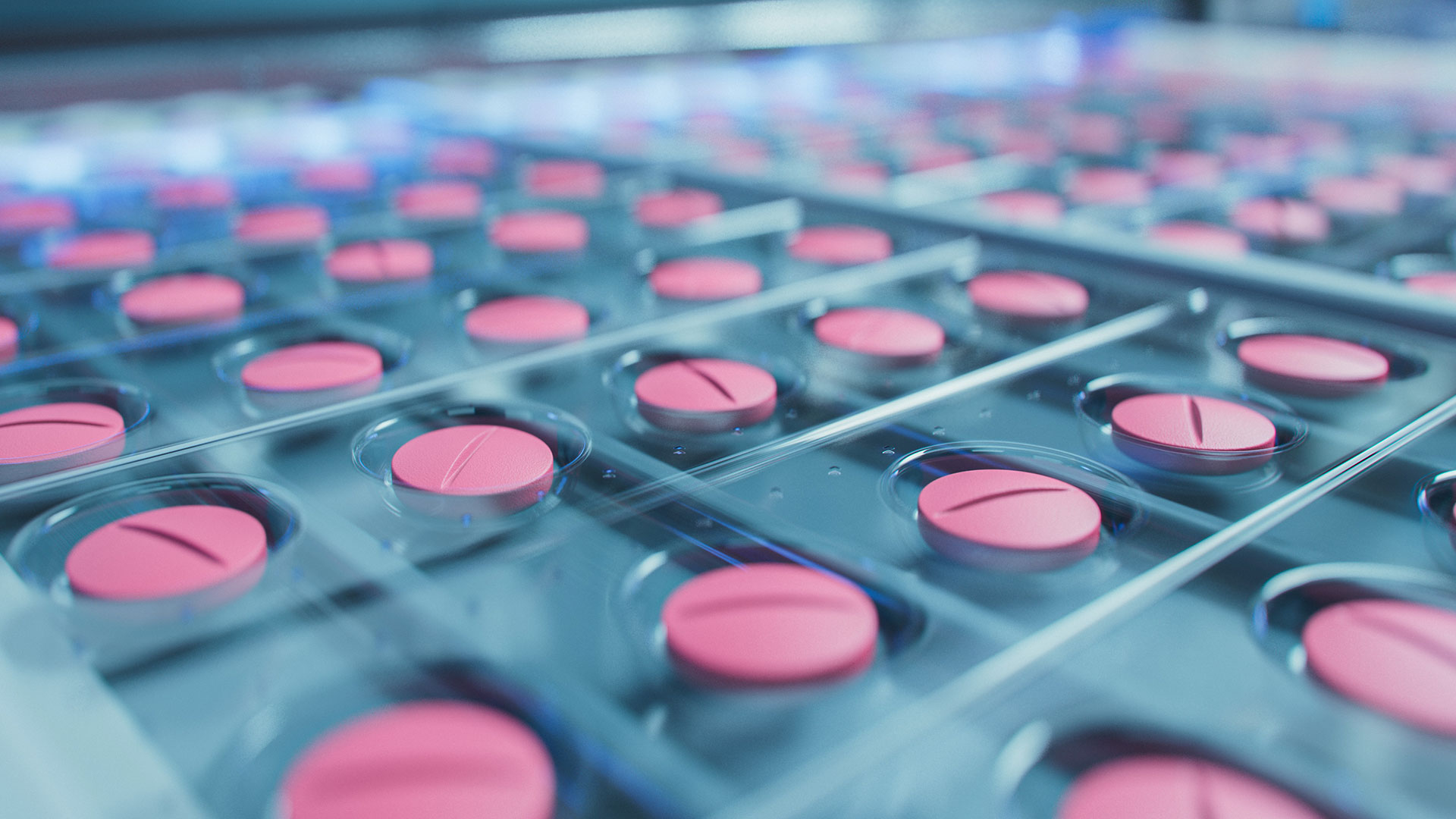 Macro Shot of Pink Pills During Production and Packing Process on Modern Pharmaceutical Factory